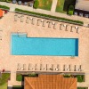 aerial view of pool showing ample seating